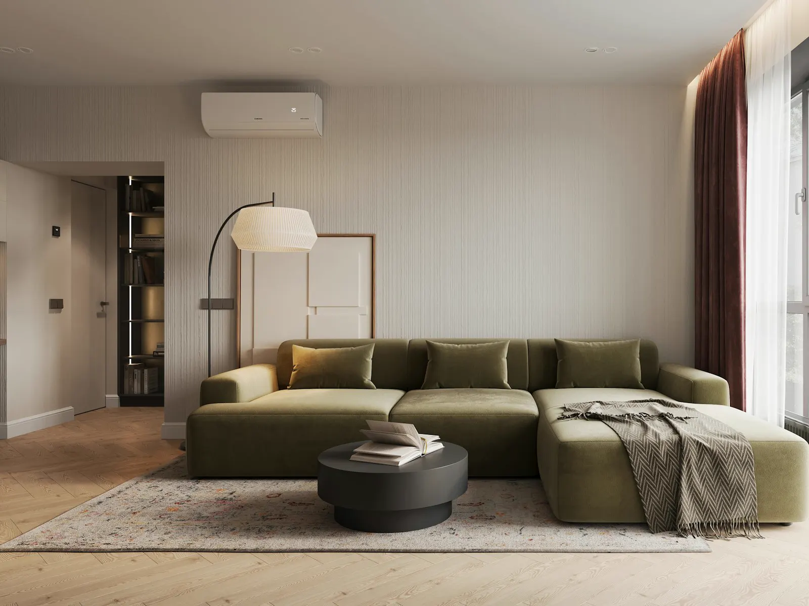 Soggiorno con pavimento in parquet chiaro e divano verde